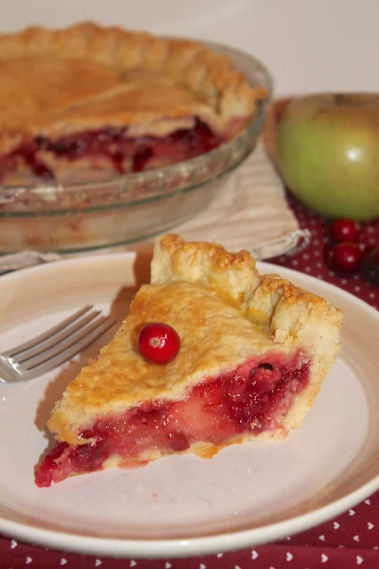 Slice of cranberry apple pie.