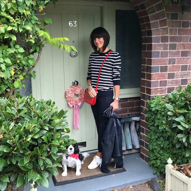 my midlife fashion, massimo dutti leather biker jacket, uterque mock croc crossbody bag, goldengoose superstar low top leather trainers, j crew cropped kick flare trousers, marks and spencer cashmere striped crew neck jumper, marks and spencer leather cashmere lined gloves