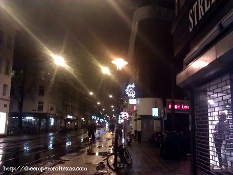 Ferdinand Bolstraat/Gerard Doustraat/Albert Cuyp Market crossing.1 hour to THE NEW YEAR 2013(LIVE caption delivered to Fb: "Soaked wet New Year, Amsterdam, the Netherlands, on the way to the city center on bike.1 hour from New Year.")