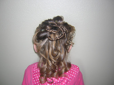 I was thinking this would be a cute hairstyle for a flower girl too.