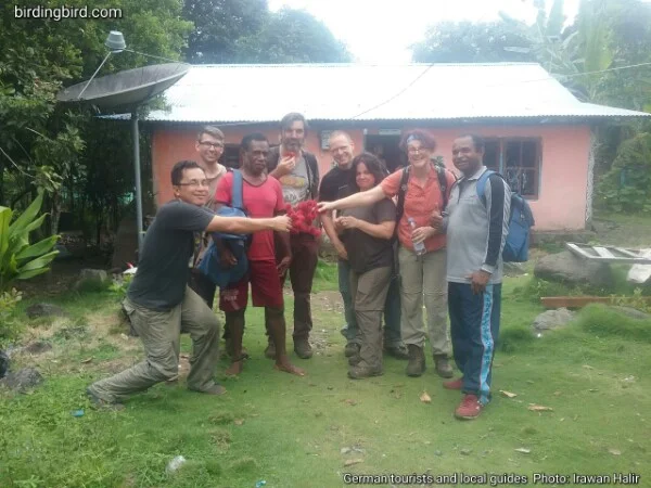 German visitors with local guides in Manokwari of Indonesia after watching King Bird of Paradise