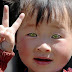 Cat-eyed Chinese Boy