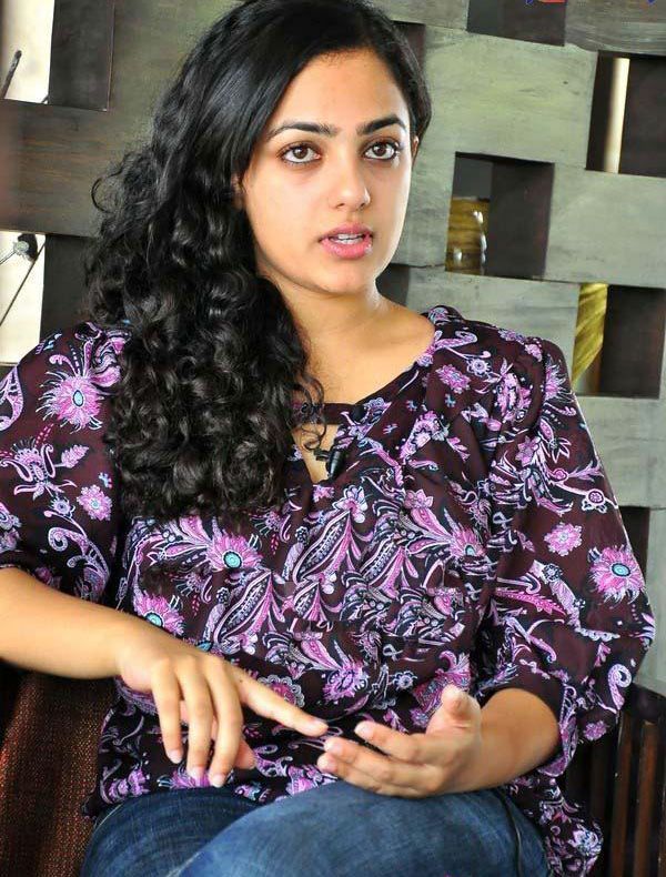 Nitya Menon  Telugu Actress Latest Cute Stills Photogallery navel show