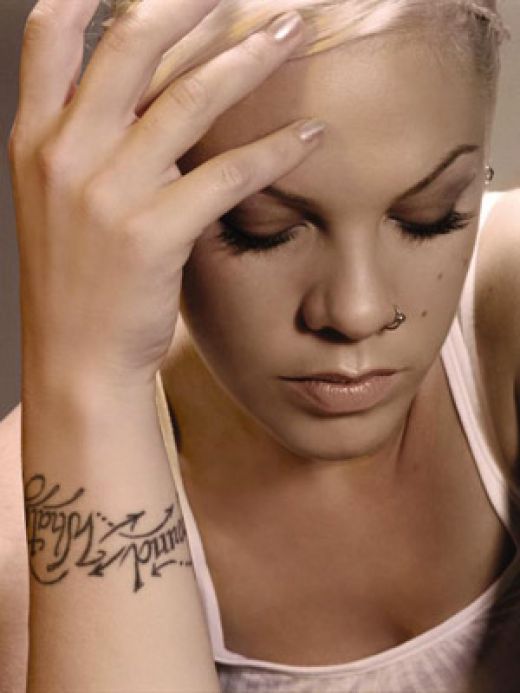 Jessica Alba Tattoo On Wrist. lettering tattoos on wrist.