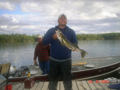 Mike with dock walleye