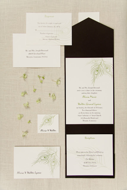 These Kiwi Peacock Feather Wedding Invitations are organized in a Black