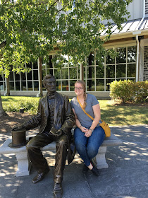 Meagan with a statue of Abraham Lincoln at the Gettysburg visitor center