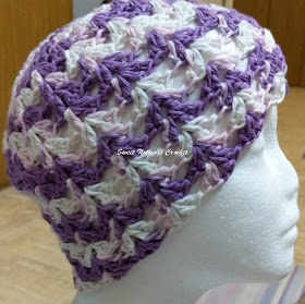Sweet Nothings Crochet free crochet pattern blog, free crochet pattern for a unisex chemo cap, photo of Chemo cap 5 made with multi colored yarn,