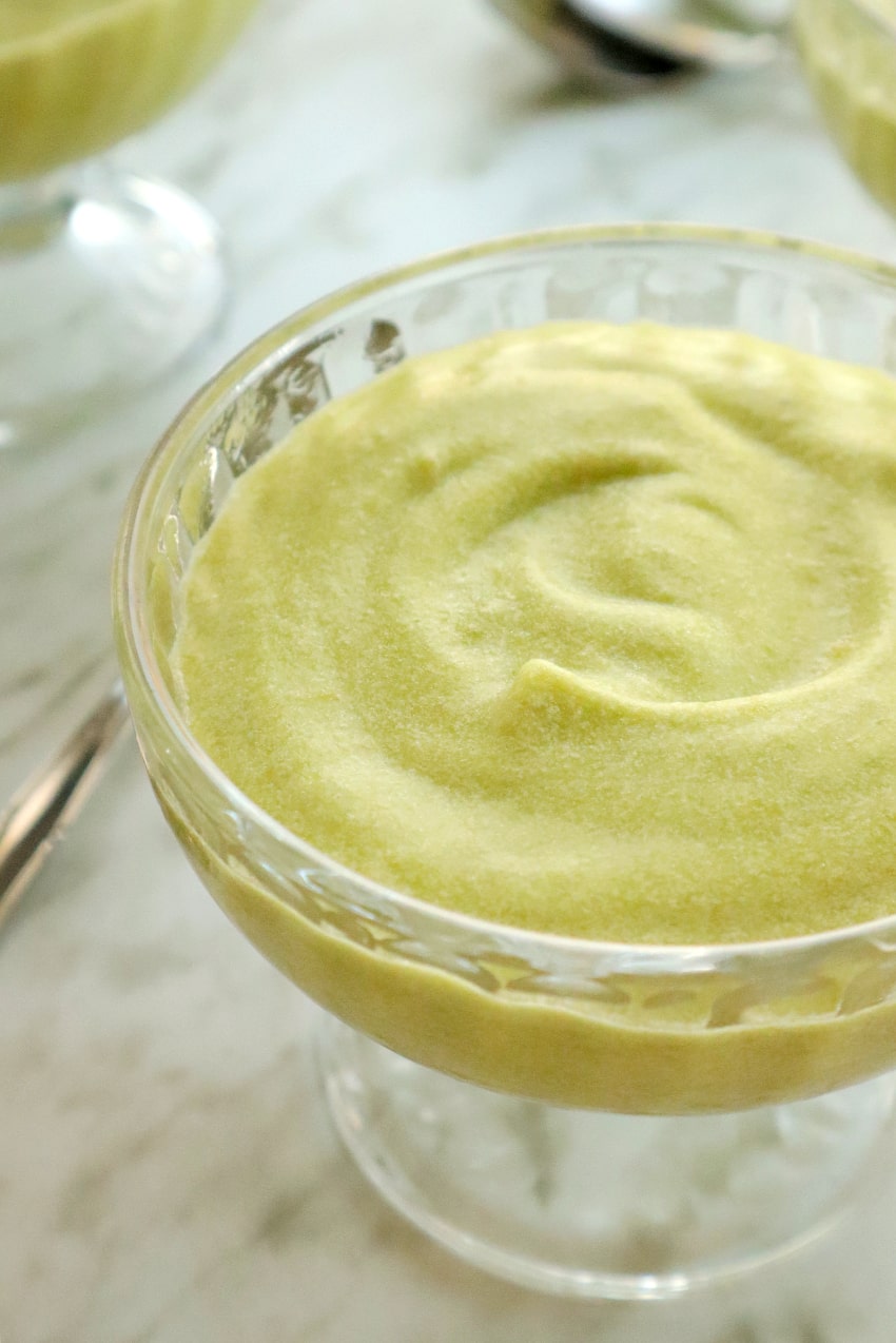 one serving of avocado mousse on a glass cup