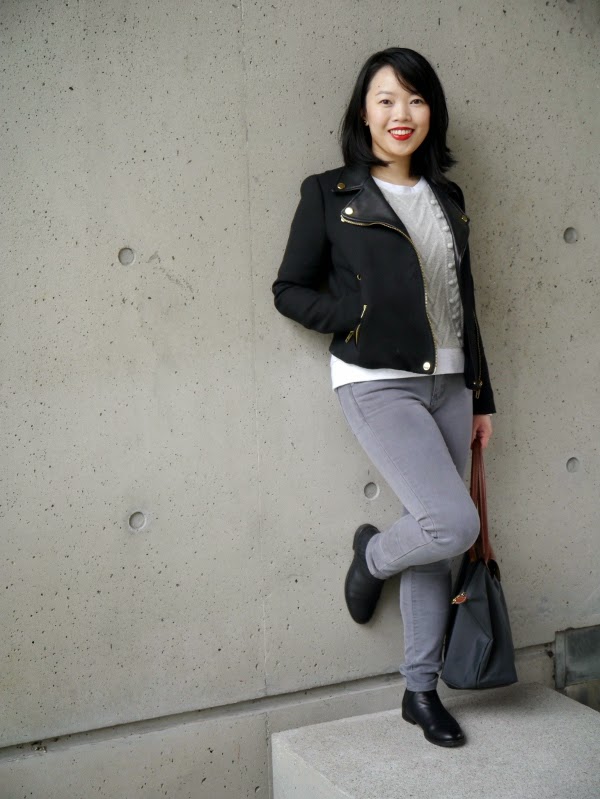 Monochromatic in a moto jacket and cable knit pom pom sweatshirt