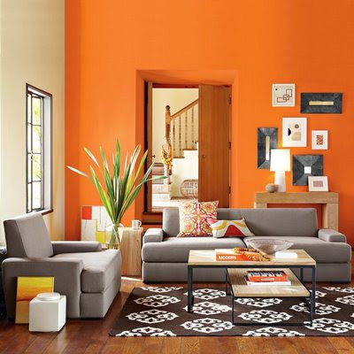 In my opinion that wall is the perfect shade of orange and the gray couch 