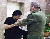 Maradona in hand kissing Cuban leader Fidel Castro 