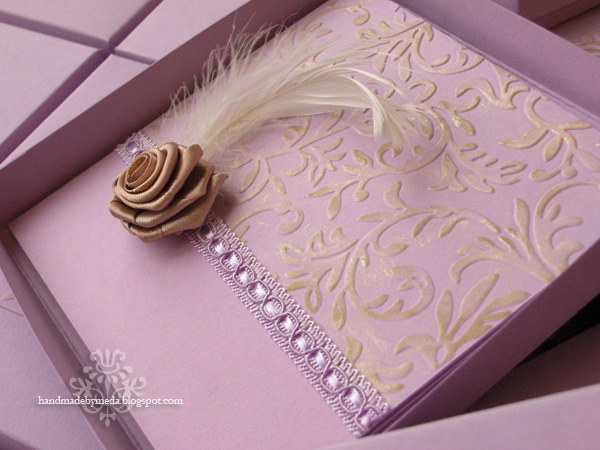 The invitation is a bookstyle card with the first page featuring the 