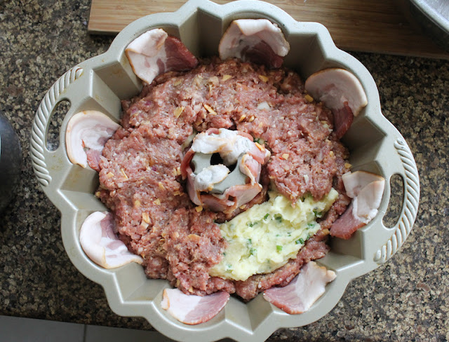 Food Lust People Love: Elevate meatloaf to a whole new level with this chive potato filled cheeseburger meatloaf Bundt recipe. It is a delicious new family favorite and a beautiful centerpiece for your Sunday supper or buffet table.