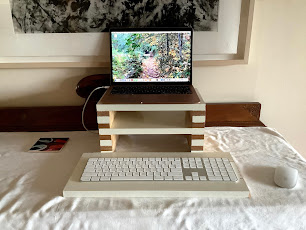 MacBook Air laptop, white keyboard and mouse