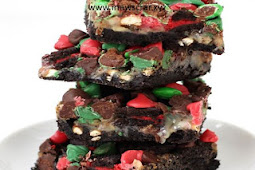 Christmas Magic Bars topped with Red and Green M&M Candies