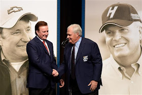 Richard Childress (left) and Rick Hendrick shake hands after receiving their Hall of Fame jackets. 