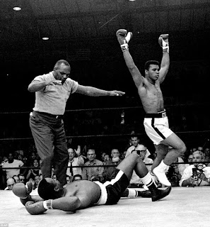 Ali wins his first World Heavyweight Boxing Title