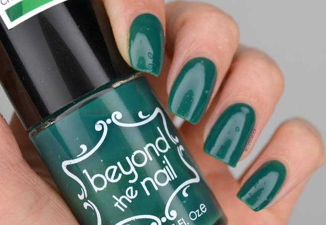 beyond the nail green thermal nail polish swatch holding bottle