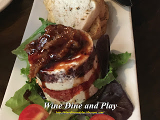 he goat cheese terrine at The Chill Restaurant And Bar in St Pete Beach, Florida is layered with three house-made tapenade choices in a French-style “Napoleon layering” with sun-dried tomatoes, kalamata olives, and the crowning third layer of a mission fig compote