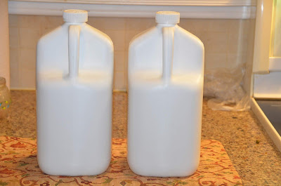 (l-r) containers of shampoo and conditioner