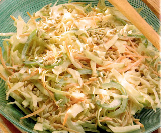 Coleslaw: A mix of cabbage, carrot and green bell pepper in a yoghurt and mayonnaise dressing enlivened with Tabasco