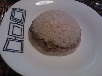 Arroz blanco con berenjena confitada