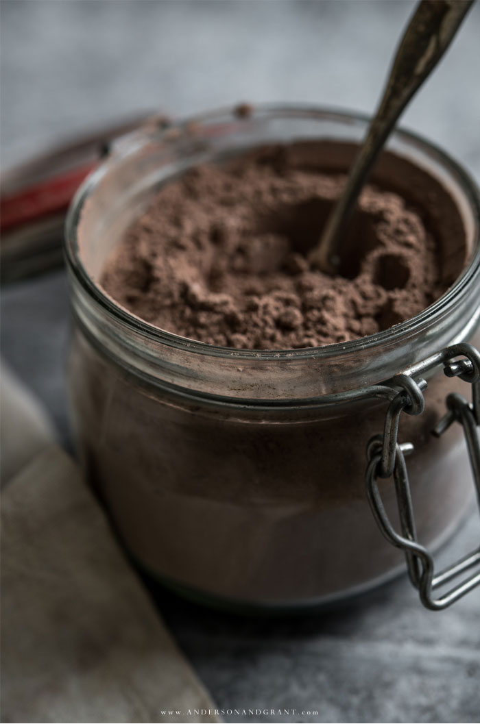 Jar of homemade hot cocoa mix with spoon