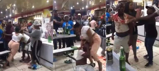 Wife breaks bottle on Her Cheàting Husband’s head in Front of his side chick (Video)