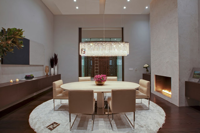 Modern dining room with fireplace 