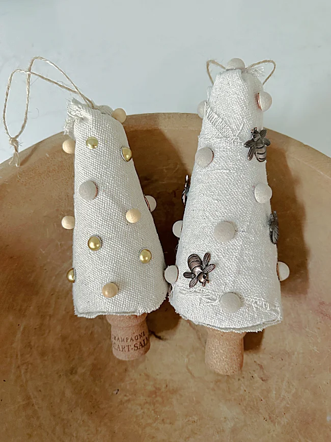 push pin ornaments in wooden bowl