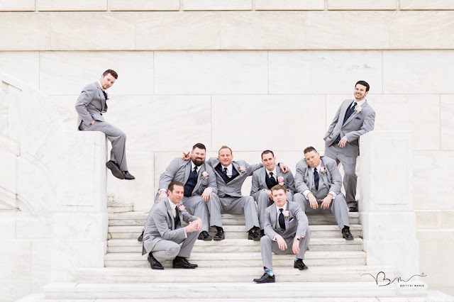 groomsmen on steps at DIA