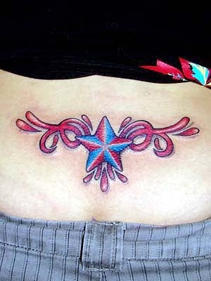 tattoos for girls on back stars. star lower ack tattoos