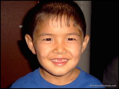 42939-this-is-a-really-cute-kid-who-lives-on-the-church-grounds-bishkek-kyrgyzstan