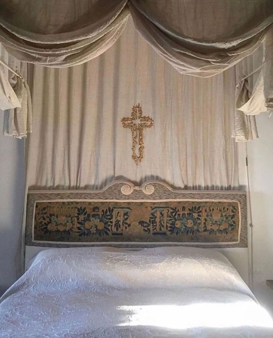 Above the bed. | bedroom details, cross, medieval decor | Allegory of Vanity