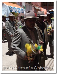 Man holding a type of musical instrument