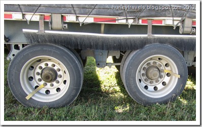 Markers on these tires help the truck driver know the axles on the trailer are turning.