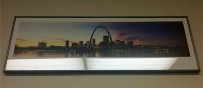 A framed picture of St. Louis at the Yale School of Management