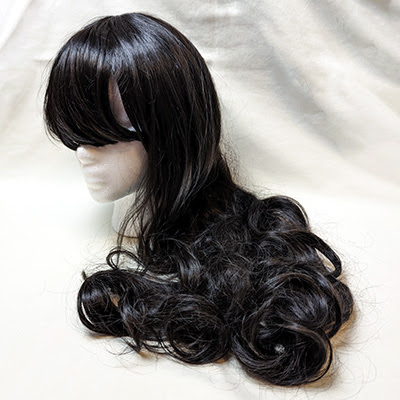 Black curled wig