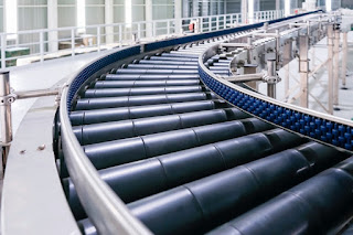 a conveyor belt made from rubber used in the industry