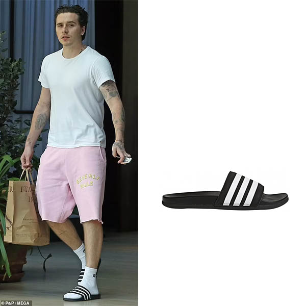 Brooklyn Beckham wearing Adidas Adilette slides on May 28, 2021