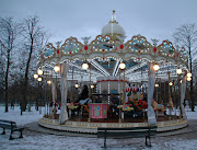 In the Paris snow, this carousel was a bright, noisy spot. (dec paris dsc crop)