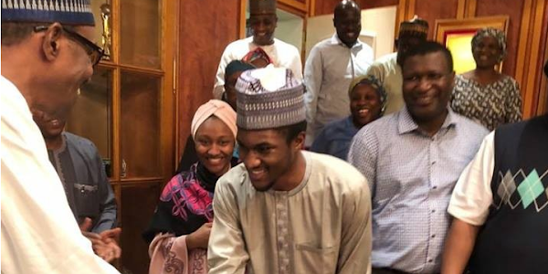 Photos: President Buhari all smiles as he meets his son Yusuf as he returns to Nigeria after medical trip to Germany