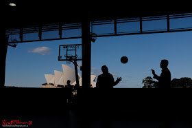 Basketball and the Sydney Opera House in silhouette. TISSOT NBA Finals Party Sydney - Photography by Kent Johnson.