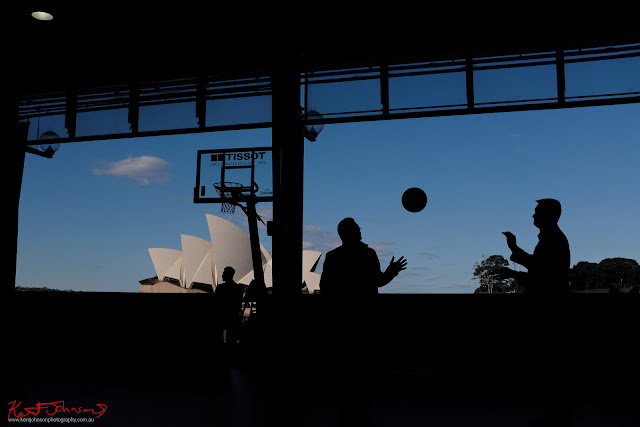 Basketball and the Sydney Opera House in silhouette. TISSOT NBA Finals Party Sydney - Photography by Kent Johnson.