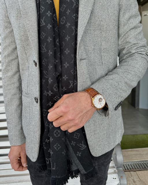 man wearing a leather strap watch