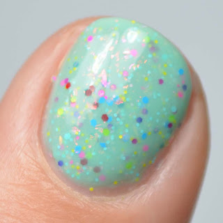 mint crelly nail polish with neon glitter