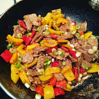 Stif fried beef in oyster sauce with lots of veg