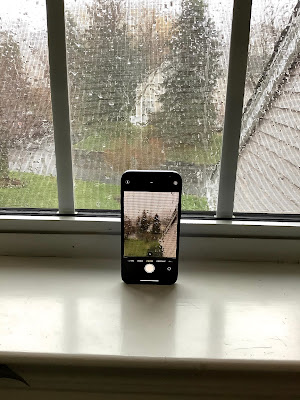 iPhone12 mini on a rainy day