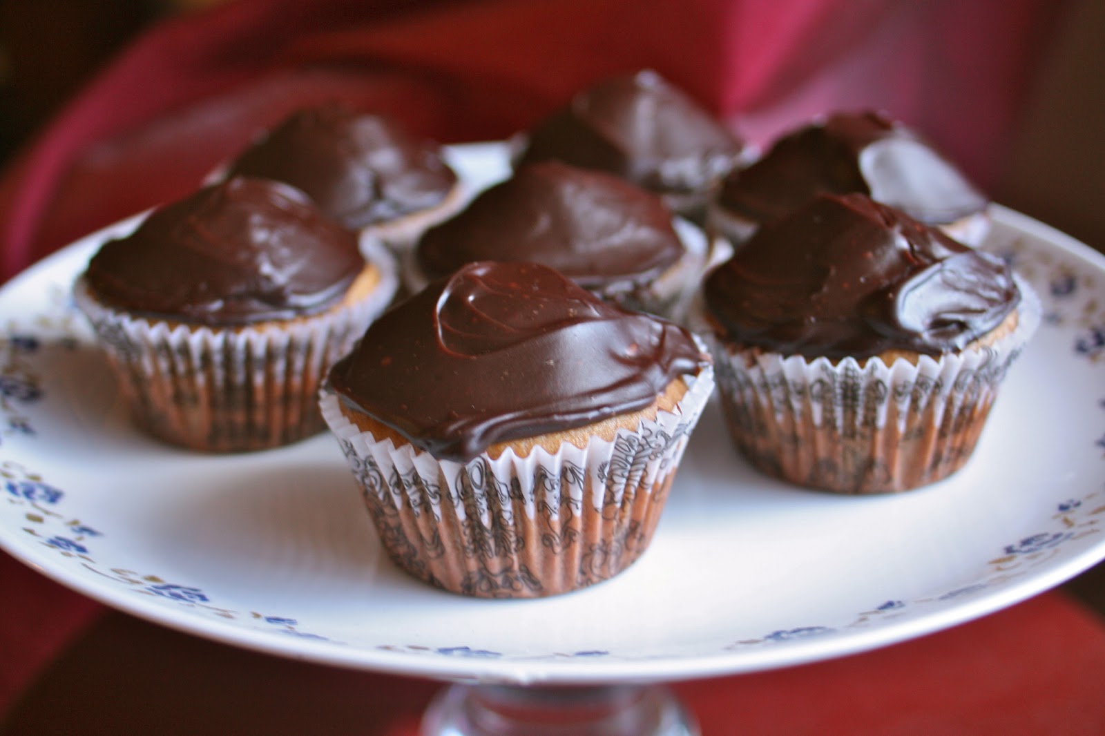 chocolate cupcakes with vanilla frosting Like the dessert stand? I'll cover how to make one from thrift 